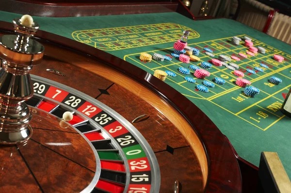 Live baccarat dealer at penidabet alternatif studio with multiple camera angles